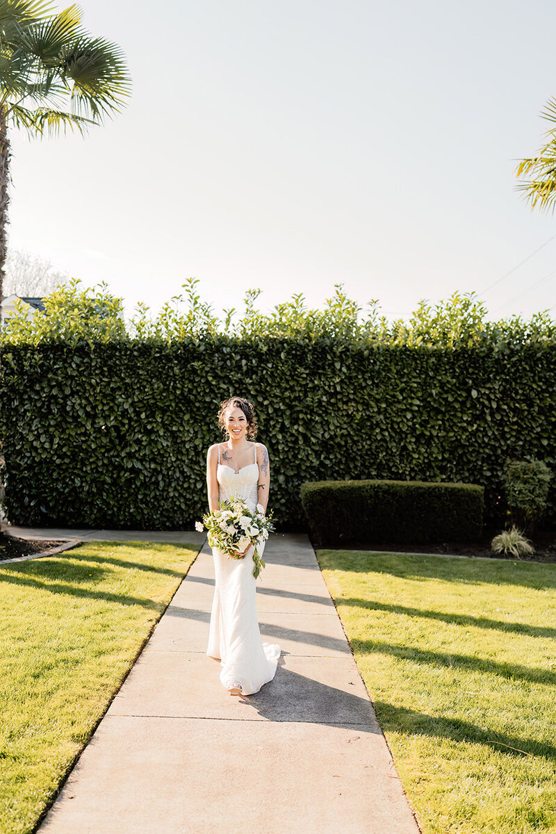 photo of a bride walking down the aisle