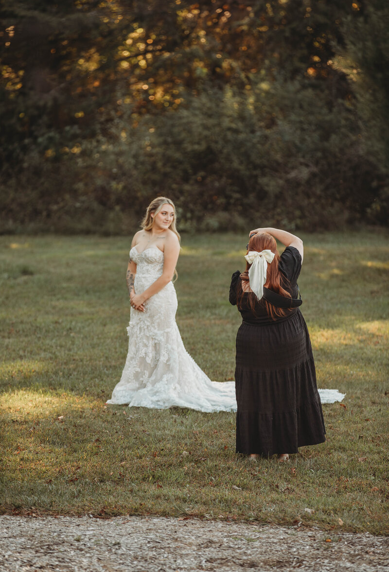 Photographer in Blacksburg, Virginia, Melena Lawson, photographs a bride.