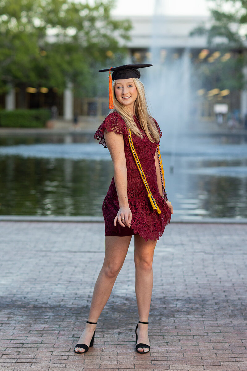 A University of South Carolina student taking her senior portraits on campus
