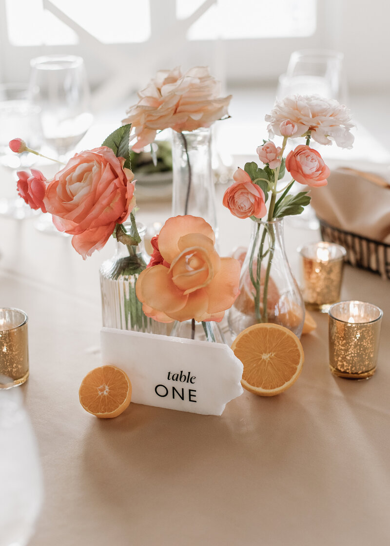 Elegant wedding reception with floral centerpieces- rustic themed