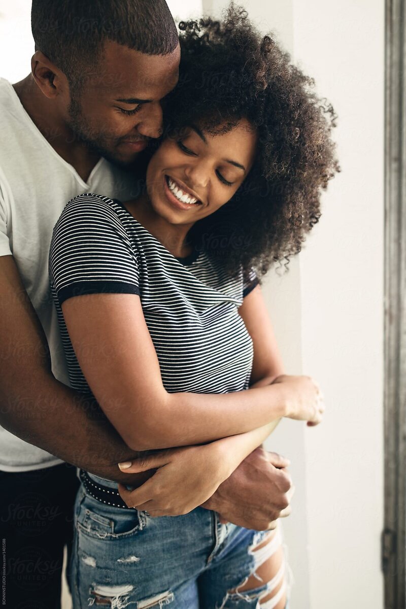 black couple hugging