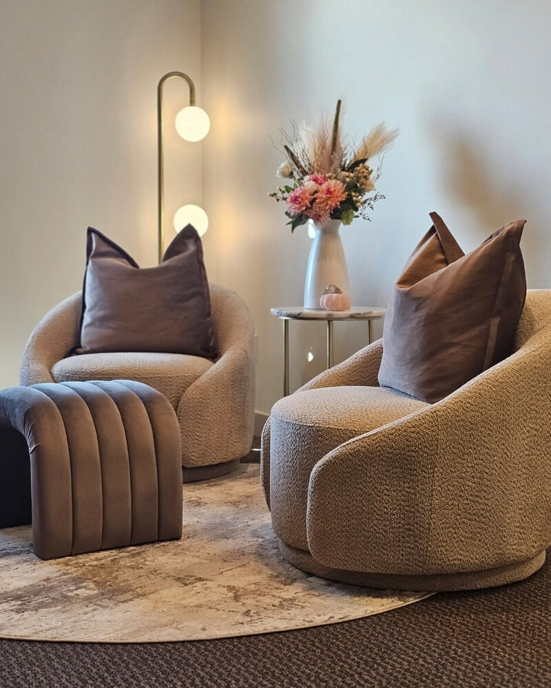 Cozy client lounge at Kurate Aesthetics

