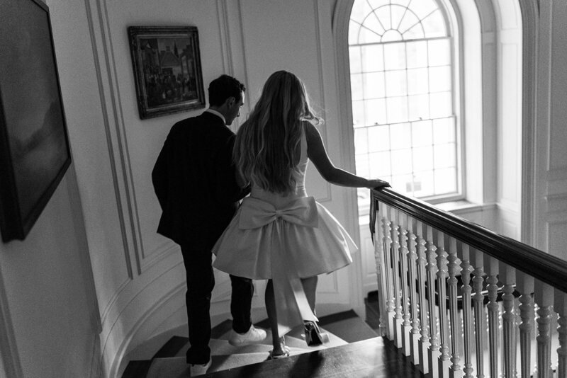 Rhode Island and Destination Wedding Photographer | Cinematic, Moody, Storytelling | Aisha Lee Photography | Bride and groom walking down the stairs