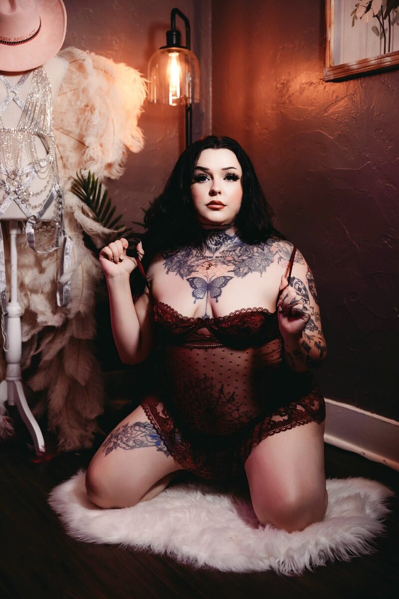 Burgundy lace fur rug boudoir photo by Ivory & Lace Studios in Kingman, Arizona