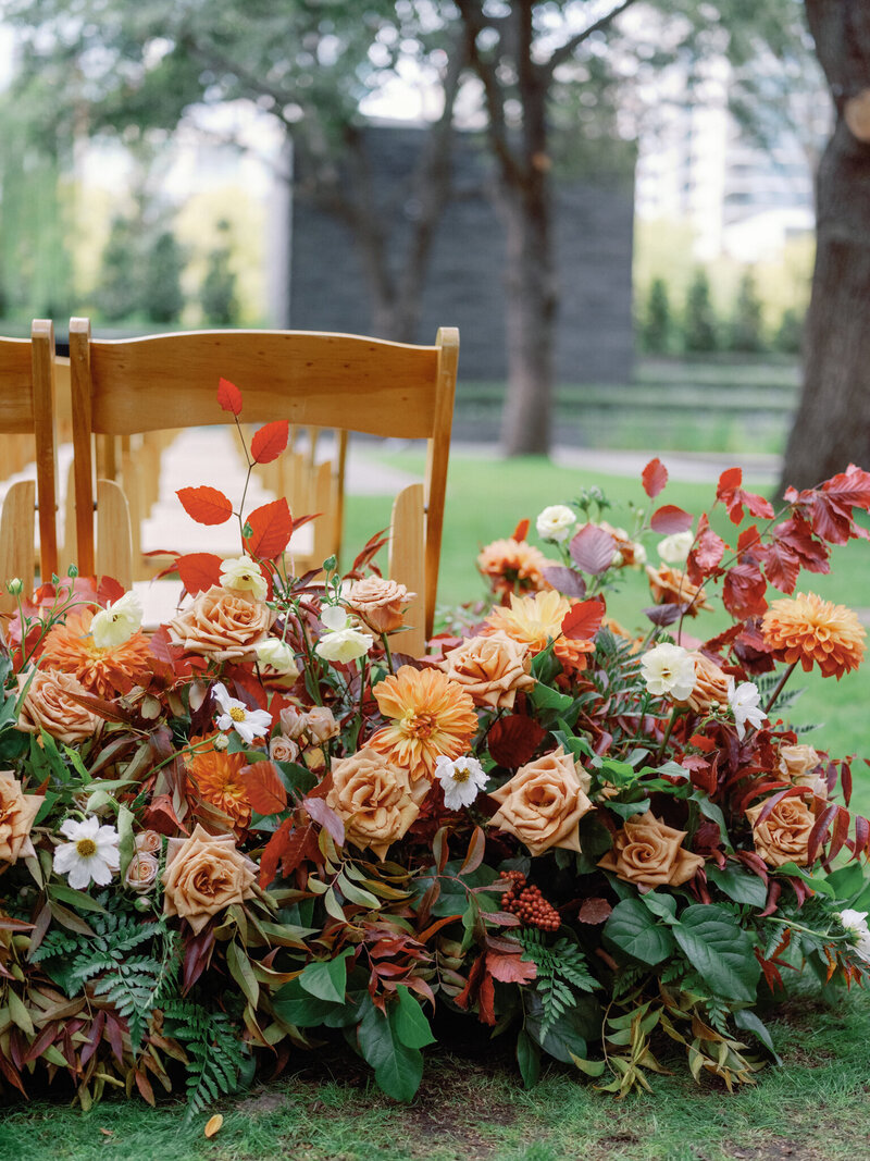 Fall colored flowers in reds, oranges and mauve