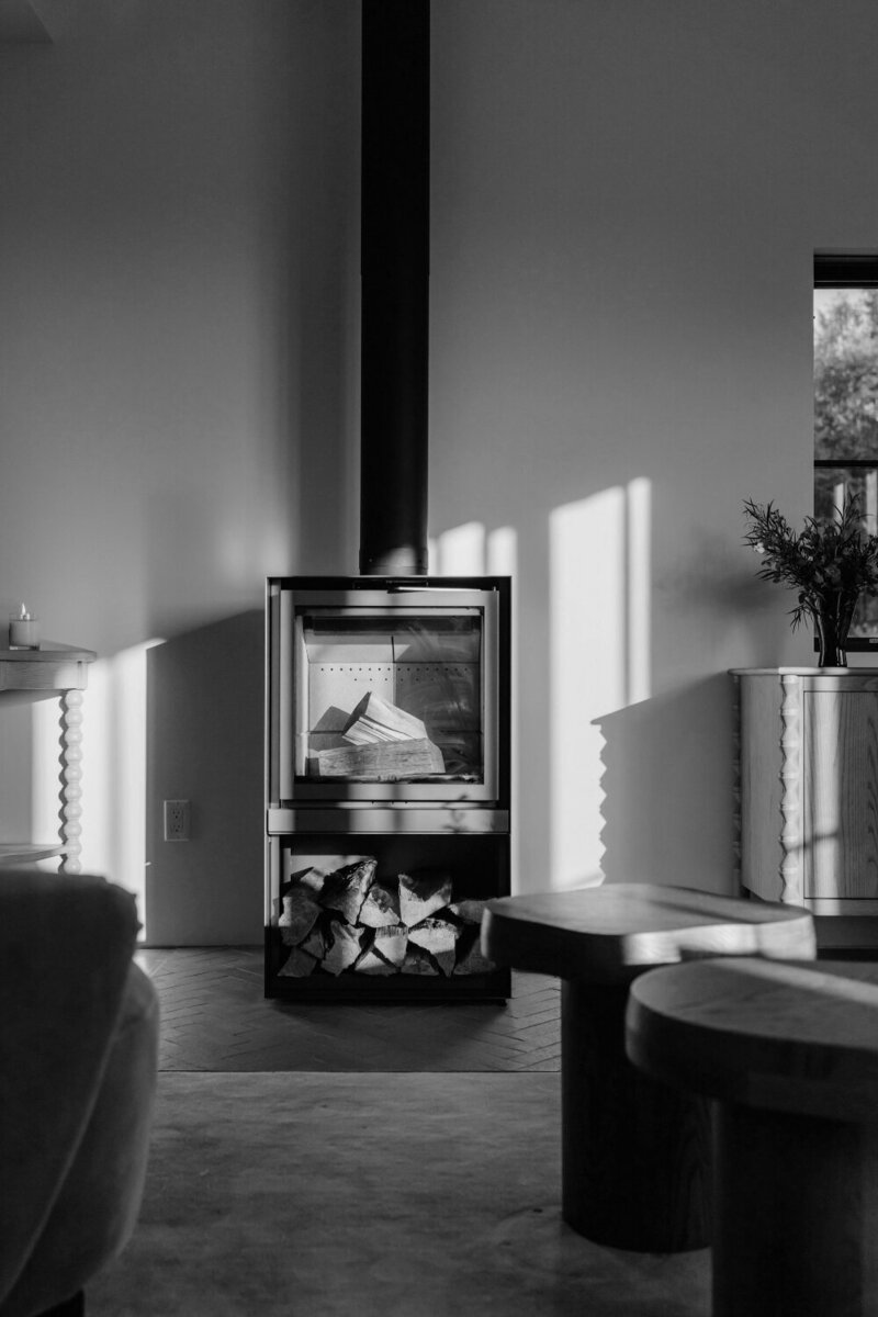 Image of a luxury home with a warm fireplace.
