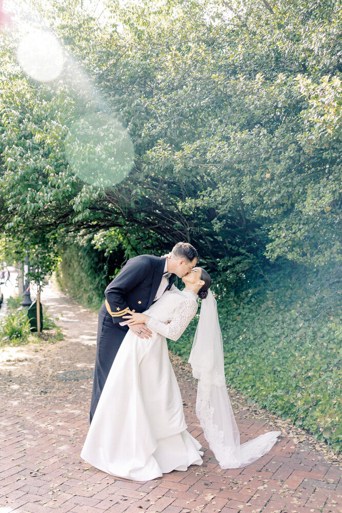 Luxury Wedding Photographer Atlanta | Bride And Groom Kissing At Classic Church Wedding Venue