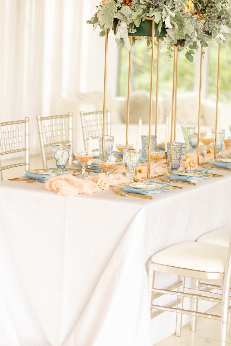 peach and green wedding reception tablescape