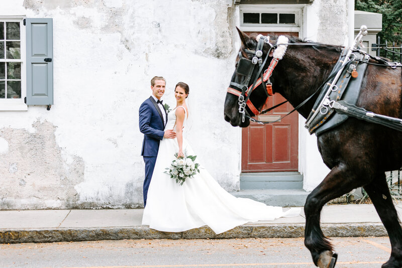 bride and groom with horse in charleston