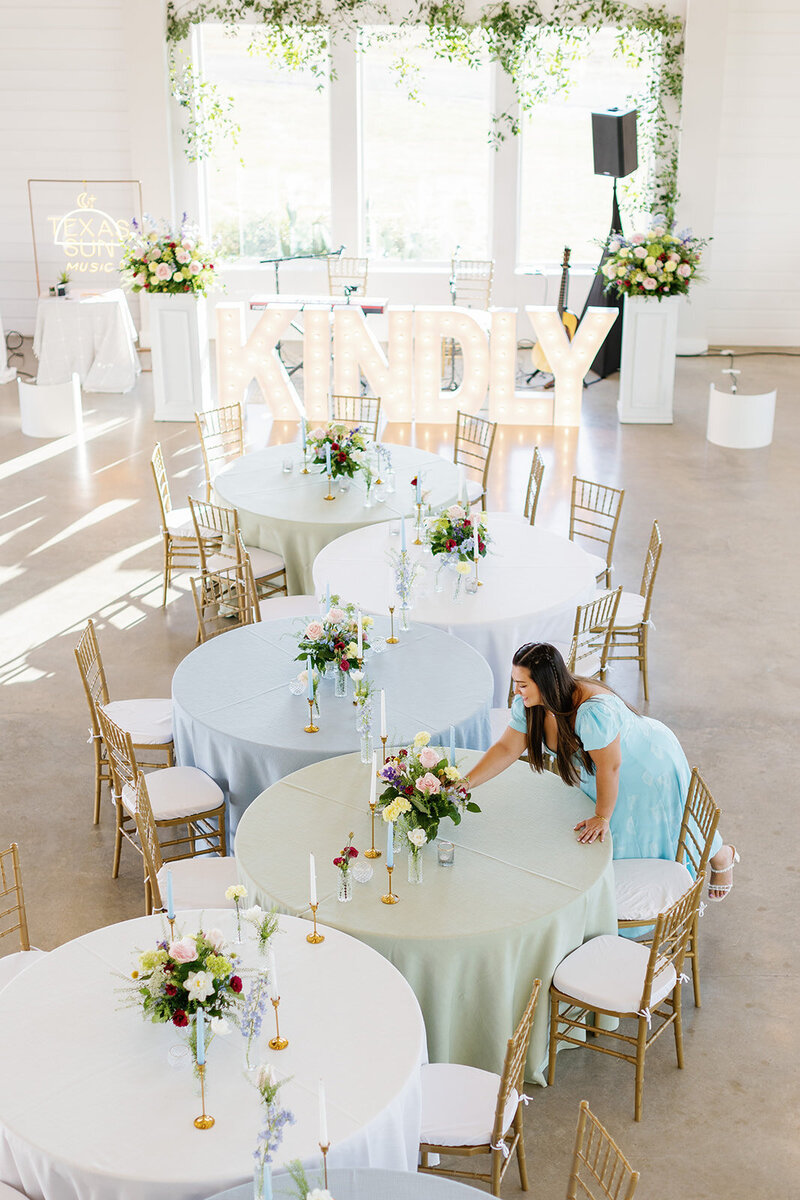 Bridal bouquet held up in the blue sky
