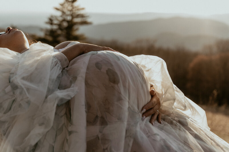 photo of pregnant woman laying down