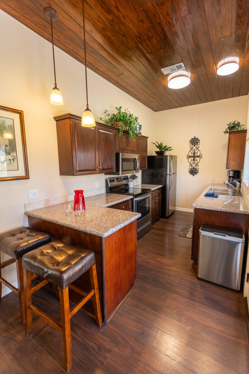 Kitcehn & bar area in hotel cottage suites in wimberley texas