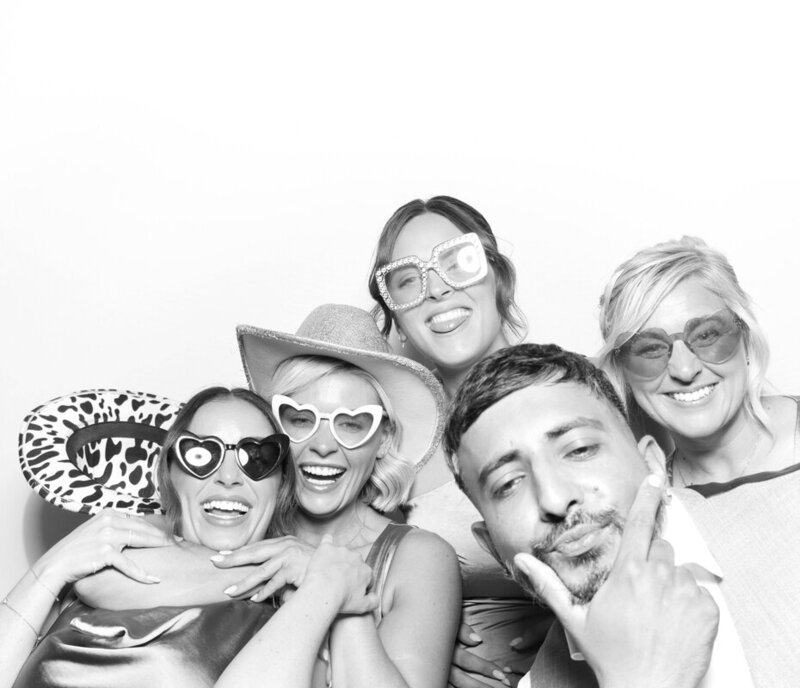 group of guests posing for the Best  Premium Photo Booth for weddings , corporate events, birthday parties at Ivy Lodge wedding venue