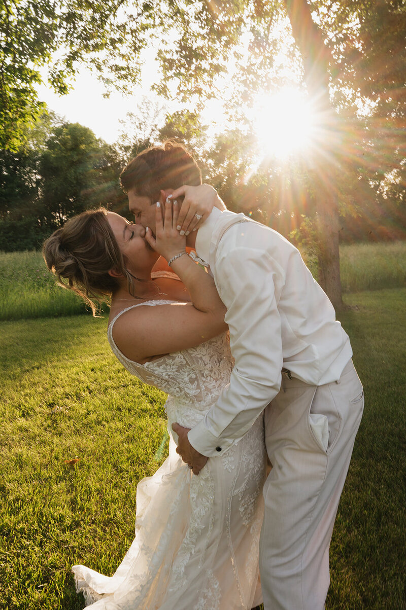 Bride and groom kissing during golden hour in Duluth, Minnesota