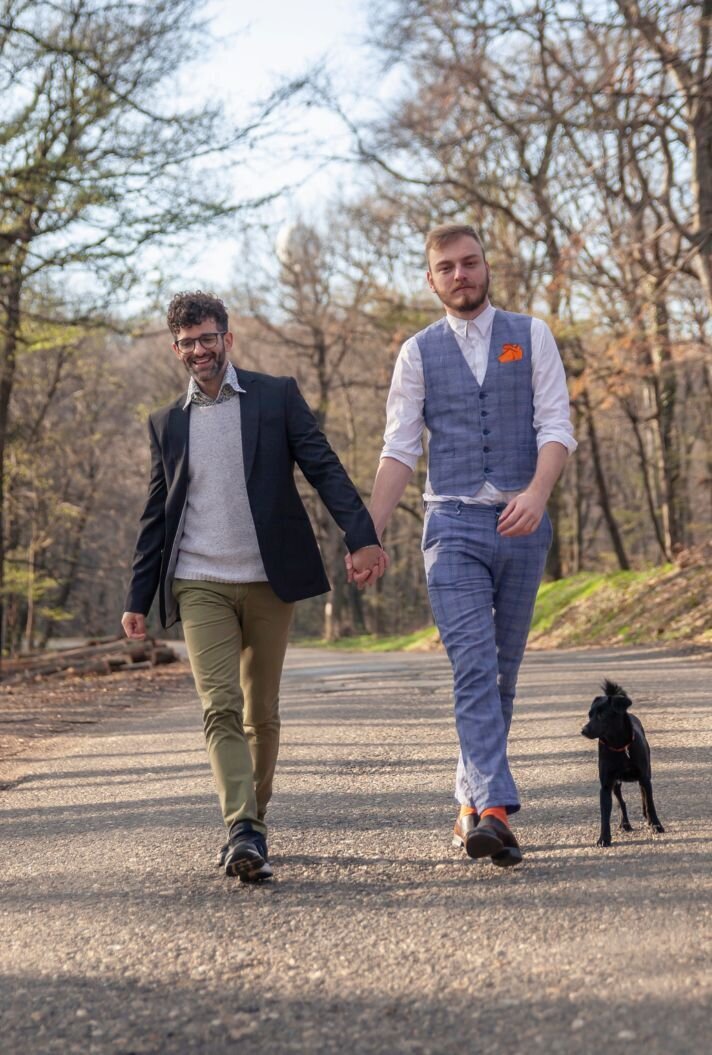Gay couple walking their dog