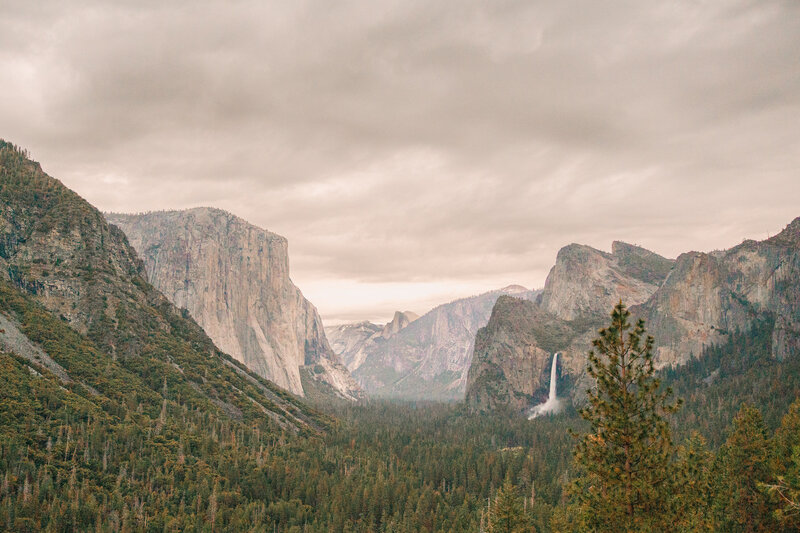 view from tunnelview at yosemite national park with waterfalls and half done