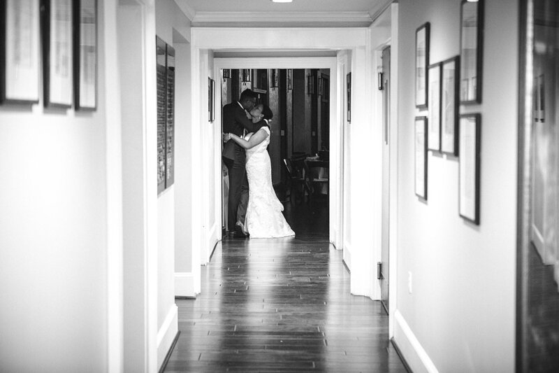 kissing in doorway by Knoxville Wedding Photographer, Amanda May Photos