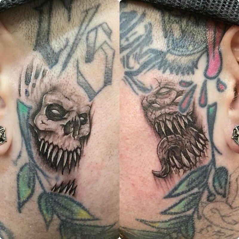 Dark Art Collective face tattoo