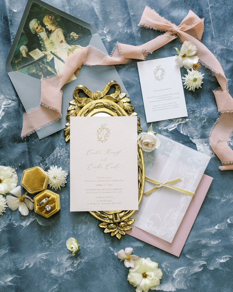 wedding invitation, flowers, rings, gold tray