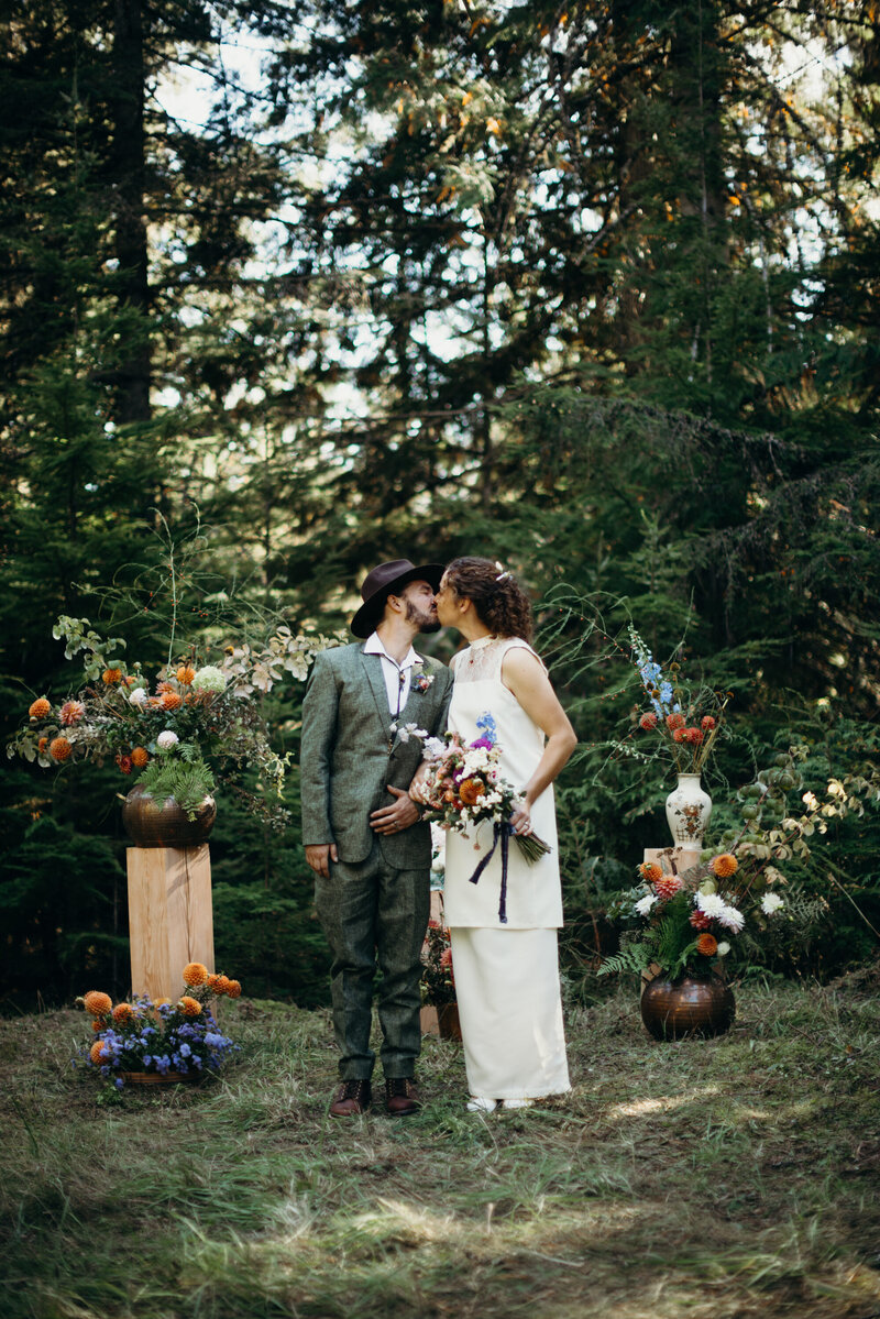 Newlyweds  kissing at salt spring island  wedding