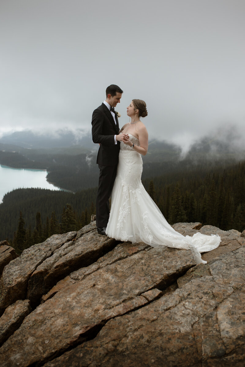 Couple seen during their wedding portraits in Canmore AB