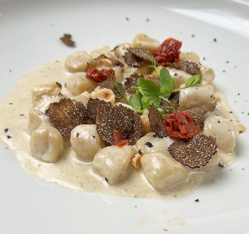 Gnocchi with black truffles at Paper Moon Giardino in Milan, Italy