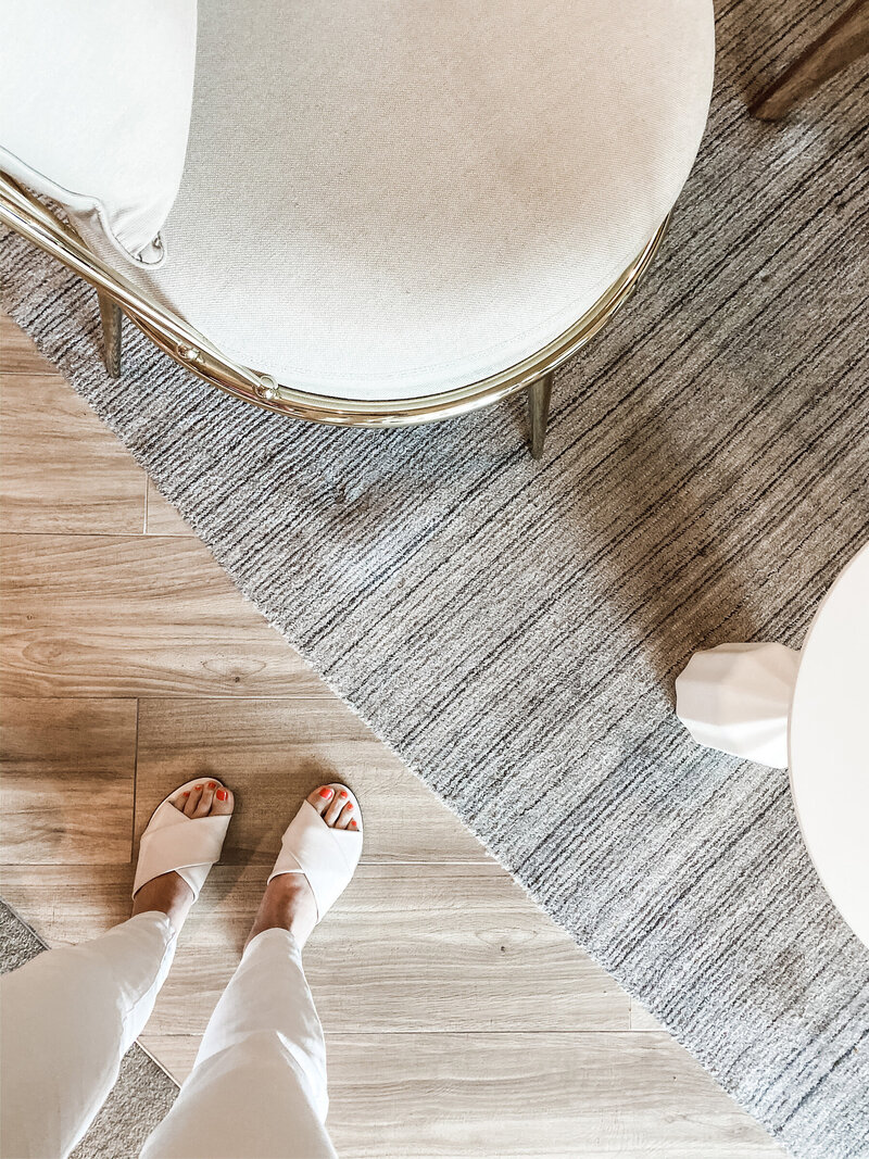 image of a black woman in slippers on a website for online coaching program moms of color 