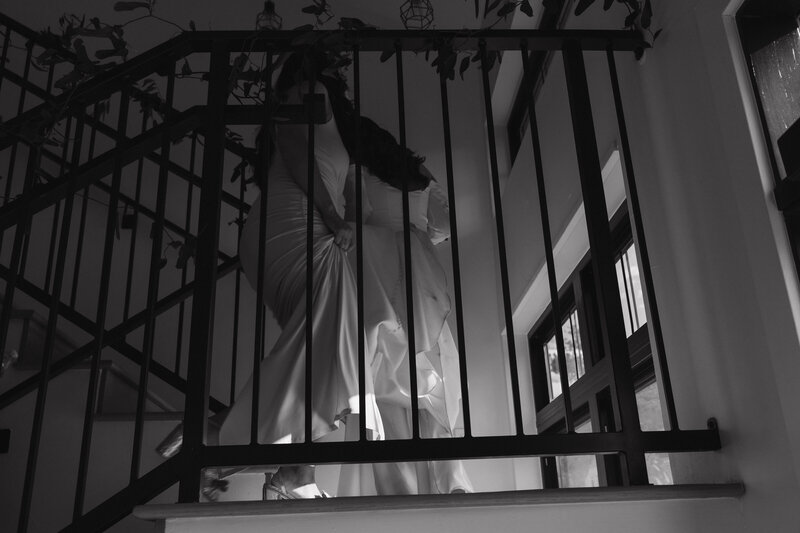 bride walking up the stairs at her intimate wedding venue in Colorado