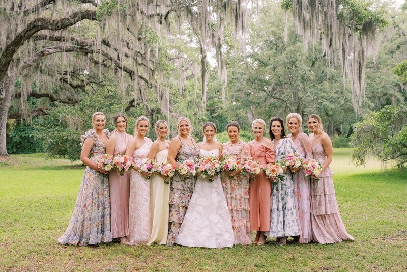 Bride takes portraits with her bridesmaids