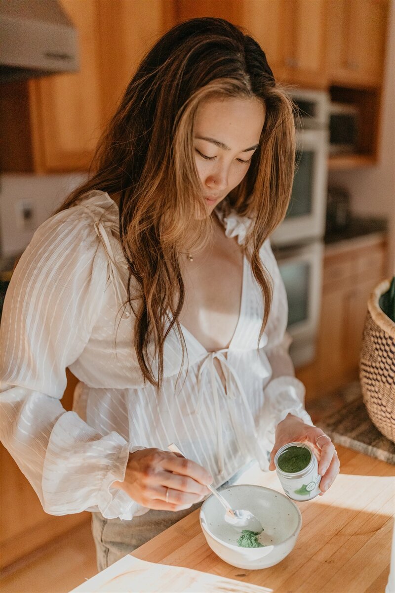 woman making tea