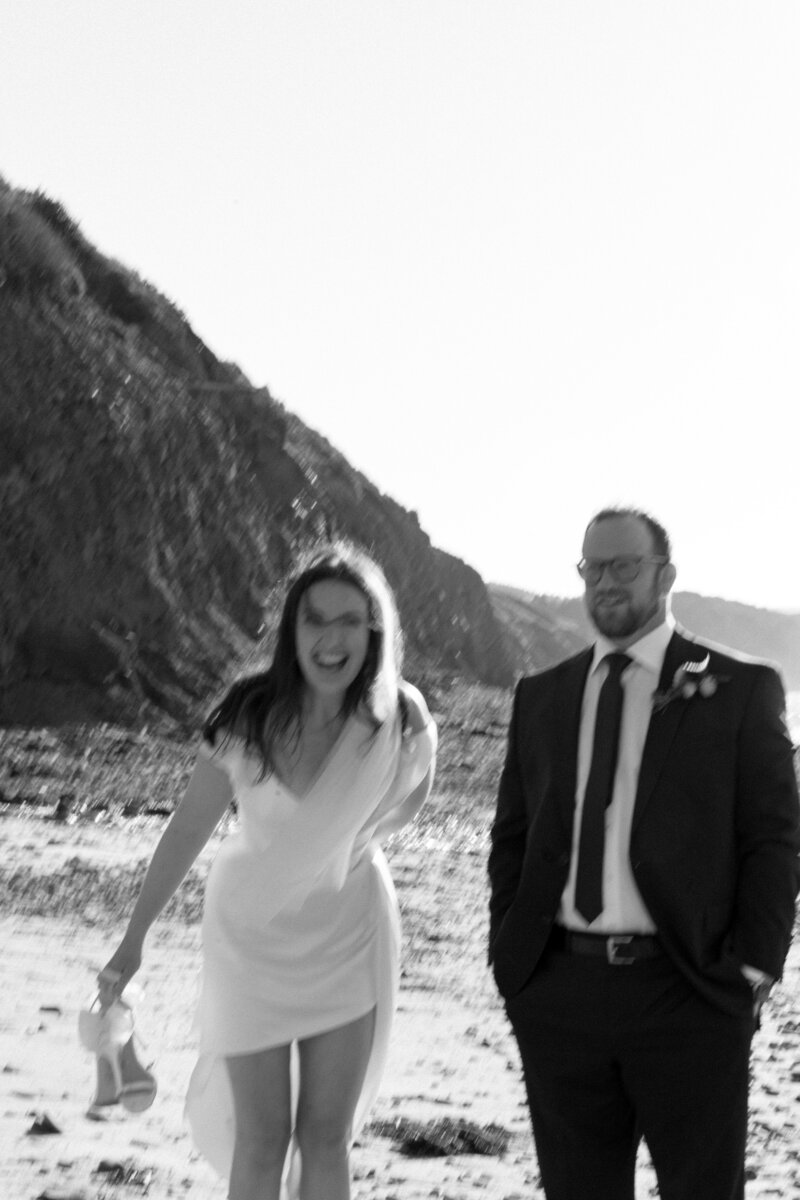Couple Kiss as they walk to their Tuscan Villa