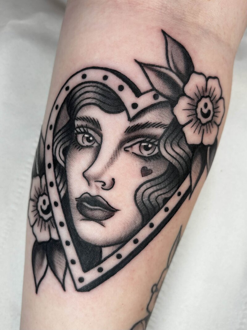 black-and-grey-trad-tattoo