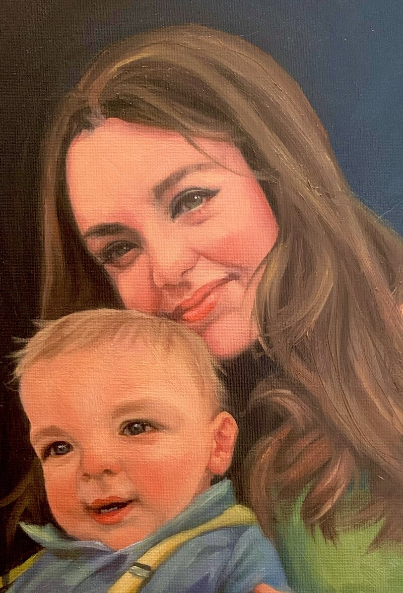 A portrait of a smiling mother and child. 