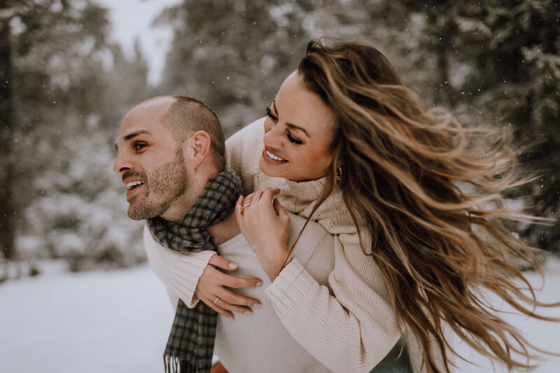 snowy colorado playful engagement session