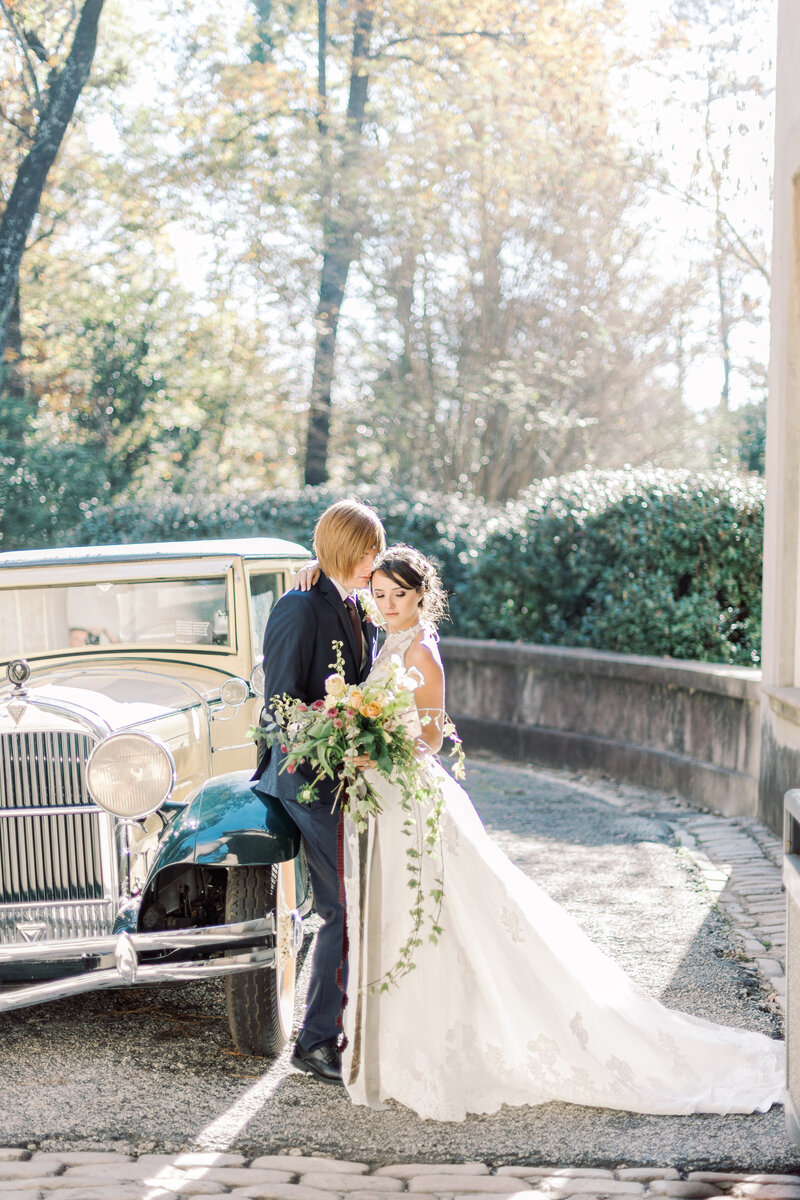 new orleans wedding photographer couple with vintage car