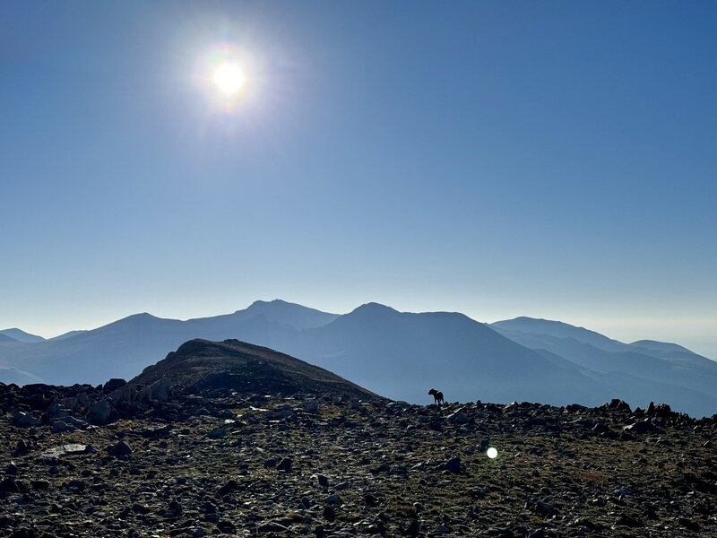 Sun over some desert mountains