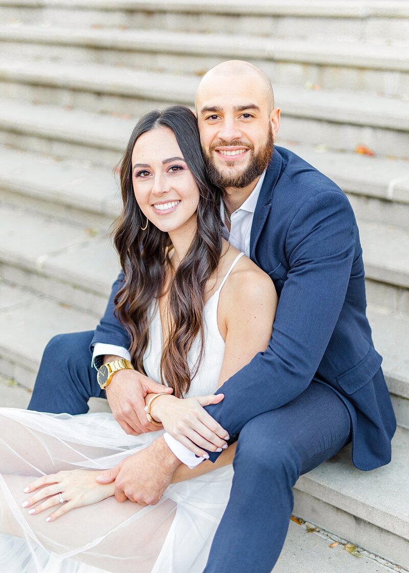 Bride and groom walk up memorial steps at their DC wedding