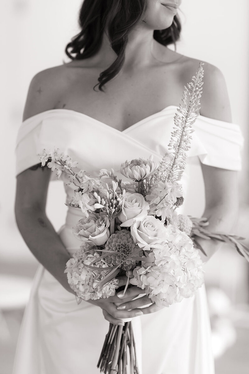 Black and white photography that emphasizes wedding day details in a creative, editorial way. Inspired by Vogue Magazine.