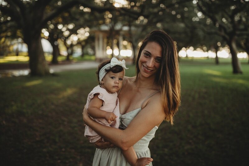 One year old daugher and mom at a milestone session at Whitepoint Garden in Charleston