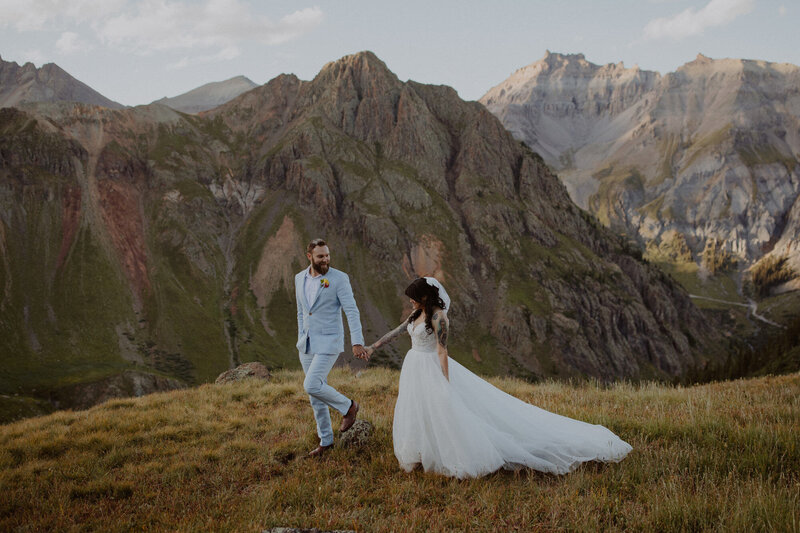 Couple walks through Colorado mountains together
