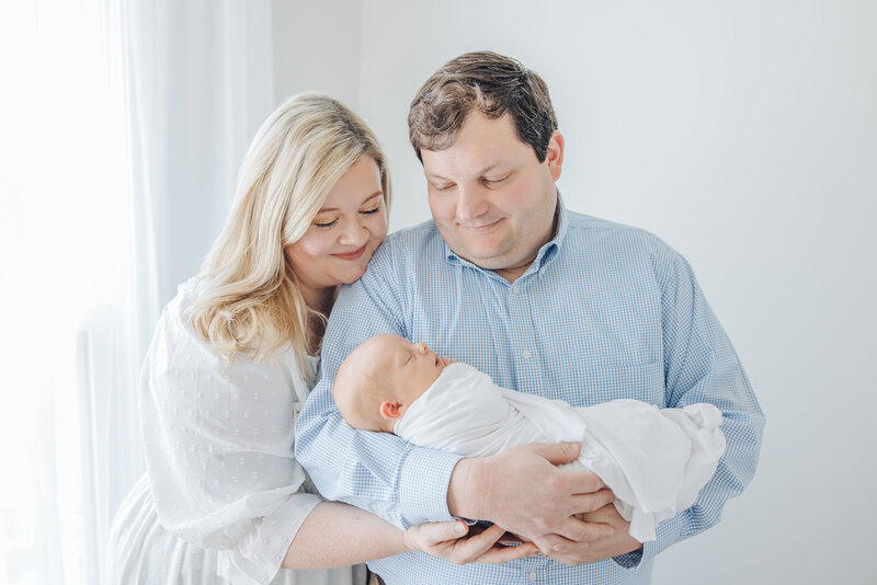 newborn photographer in madison al by whitney briscoe - couple holding baby