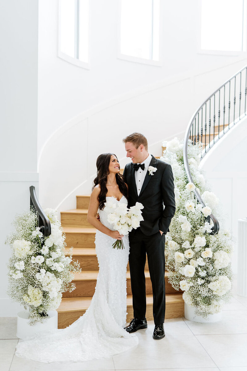 Bride and groom on the staircase at the preserve at canyon lake