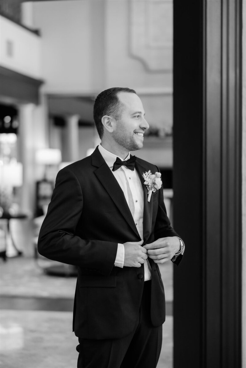 Black and white portrait of the groom at the country club of Orlando.