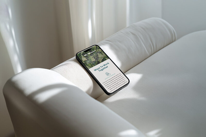 Mockup of an iPhone displaying a nutritionist website design with vibrant colors and user-friendly design.