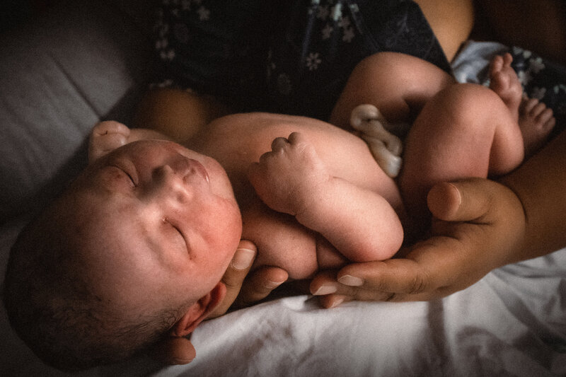 Newborn in Mother's Hands