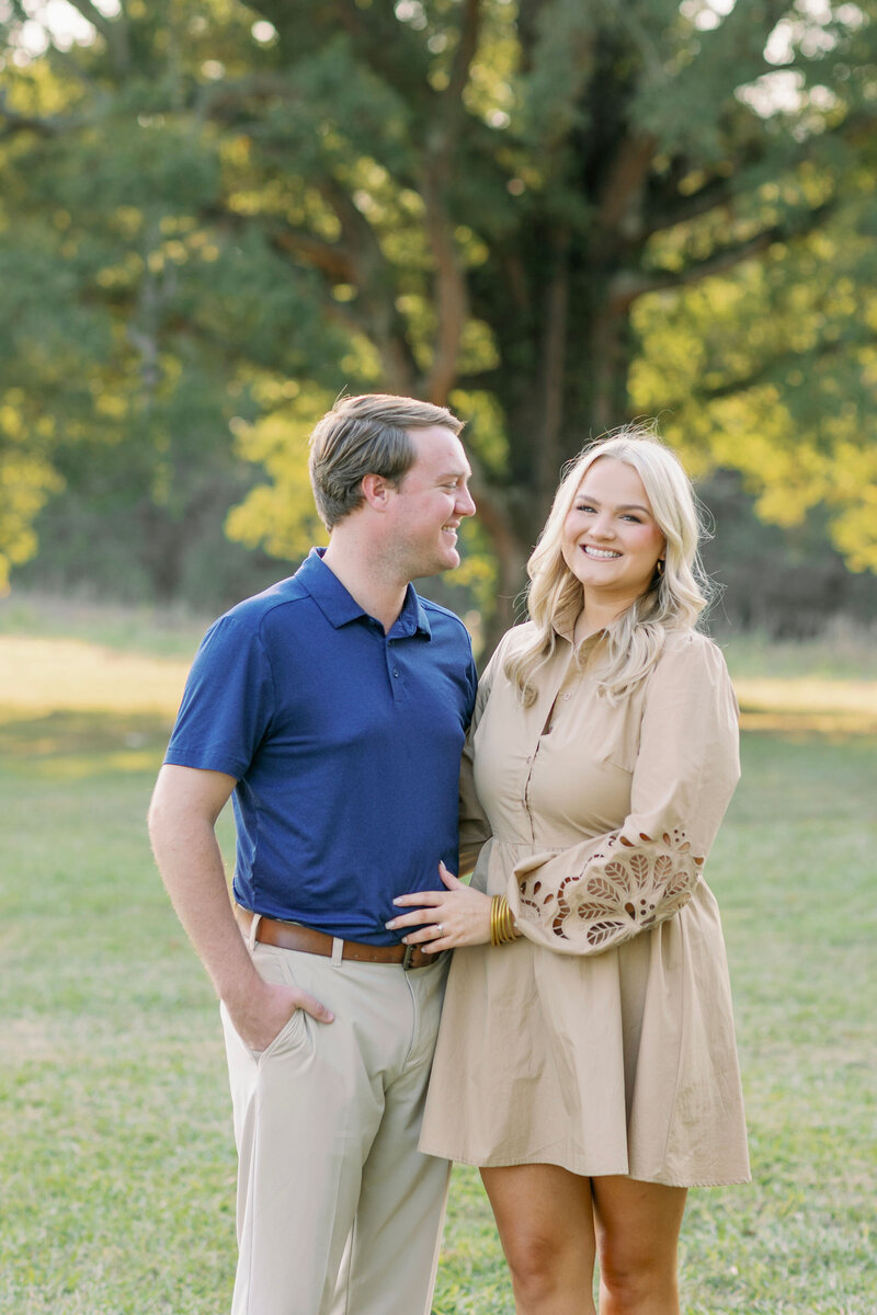 Couple smiling in the forest