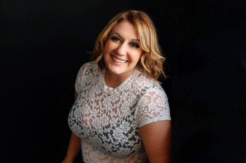 Amanda Gibson of Gibson Boudoir wearing a lace crop top.  Toronto Boudoir Photographer.