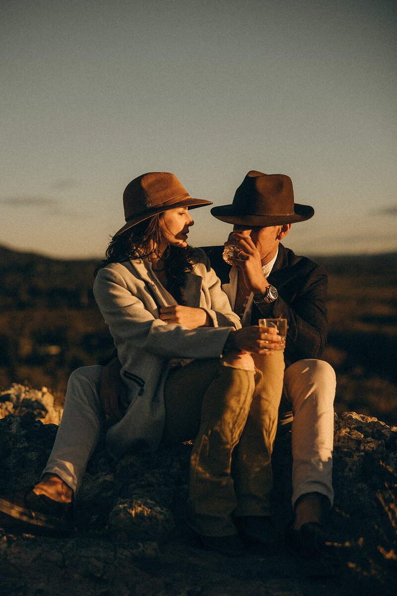 Close-up of couple sharing a quiet smile in golden sunlight captured by Sunshine Coast photographer