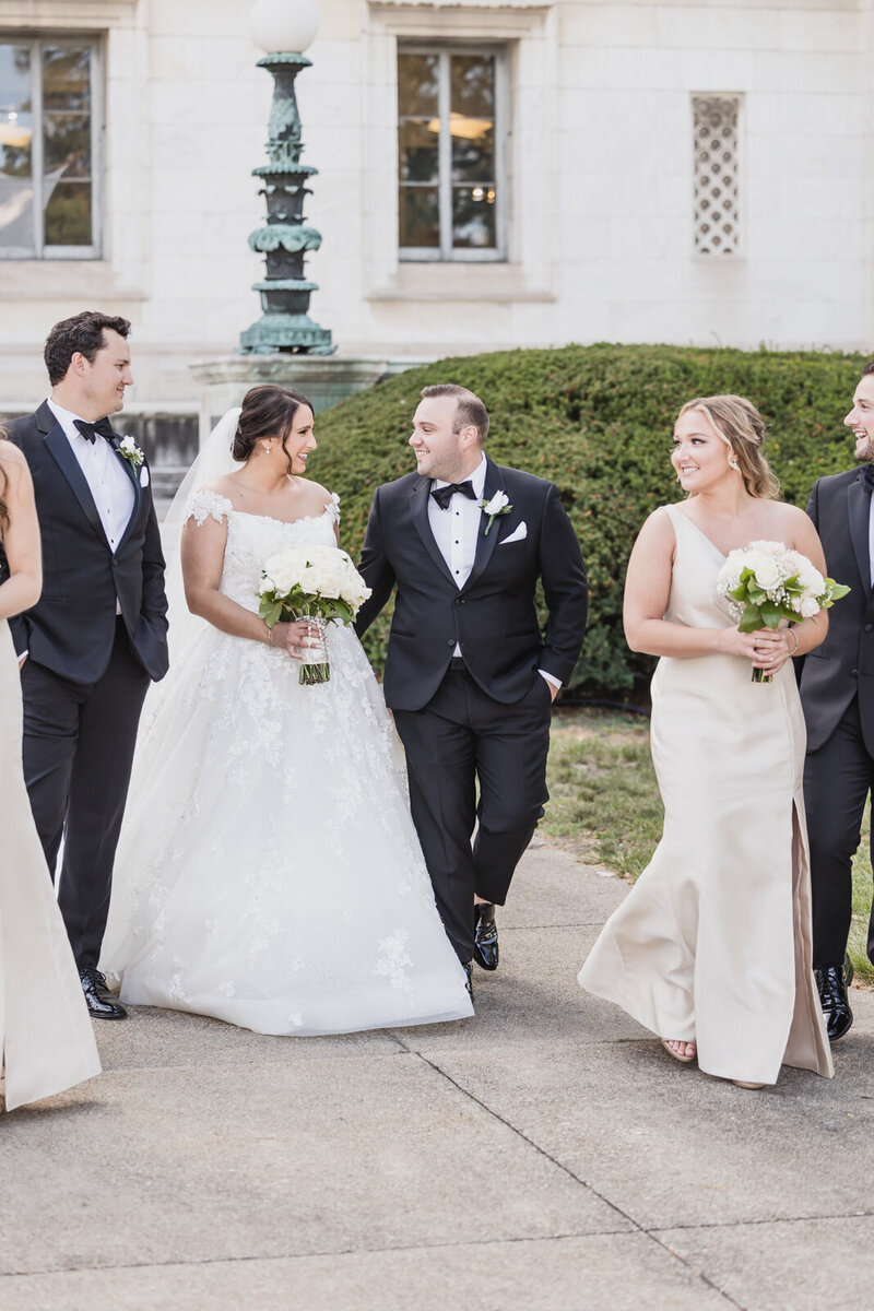 A classic Catholic wedding at Saint Peter and Paul Church in downtown Detroit followed by an elegant reception at Andiamo in Warren, Michigan. Timeless style, heartfelt moments, and refined details throughout.