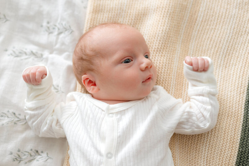 Family of  5 welcoming baby boy into their family at her home session in Savannah, ga